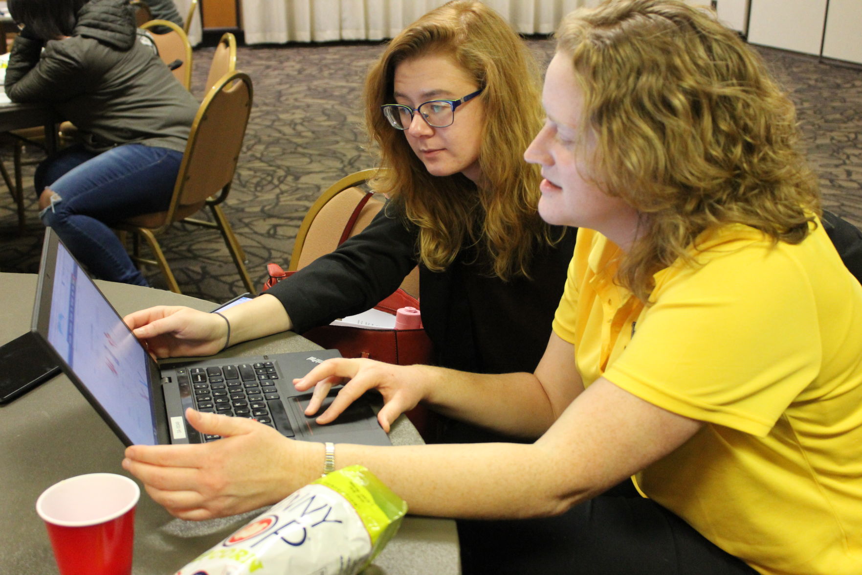 CAB asst. directors working on project.